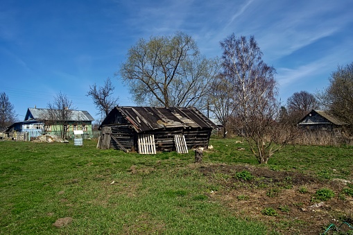 Old buildings in the countryside in spring, Russia