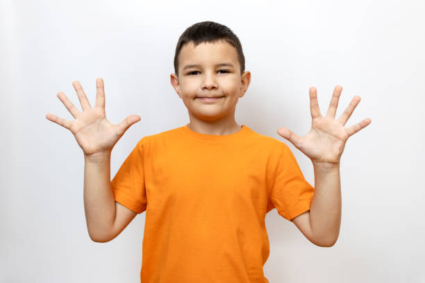 The guy raises his palms up. Sincere children's emotions.