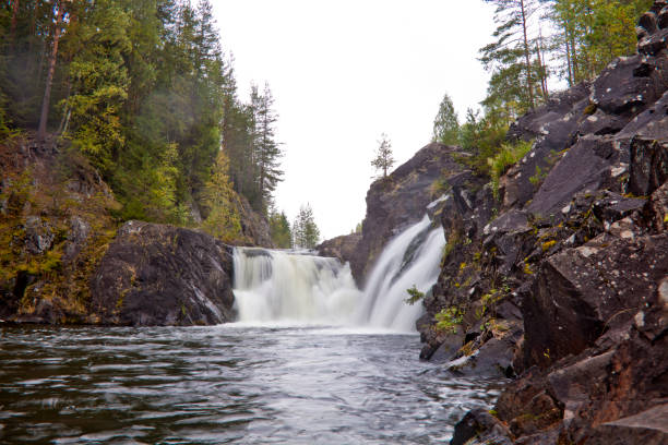 istock Kivach waterfall. Karelian autumn landscape, Russia. 2150402344