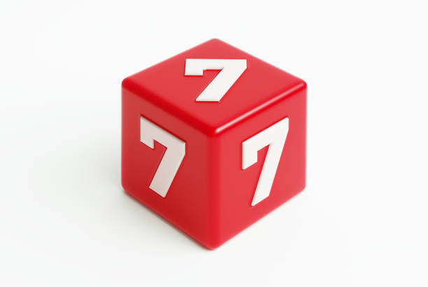 istock Red Cube With Extruded Number Sevens On White Background 2150402662