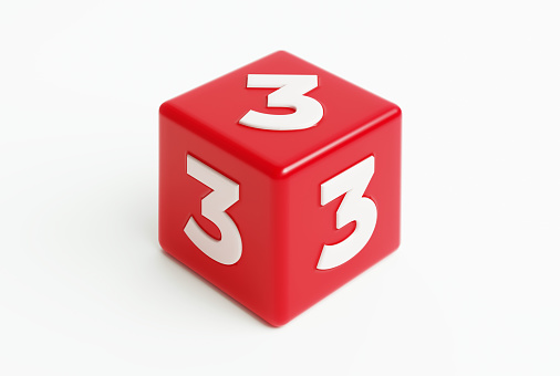 Red cube with extruded number threes on white background. Horizontal composition.