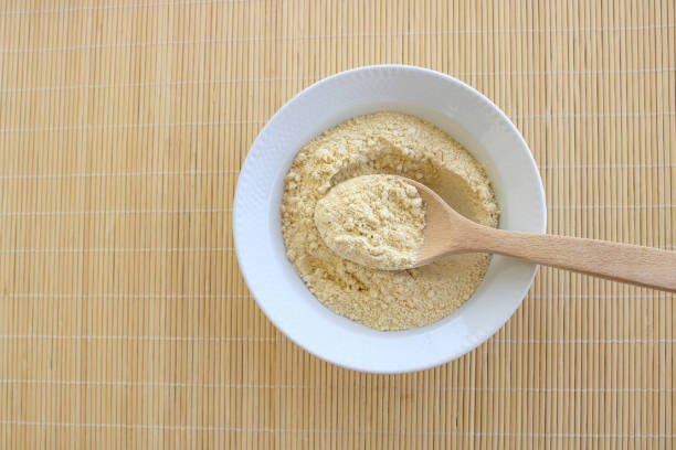 istock Chickpea flour in bowl, top view 2150404098