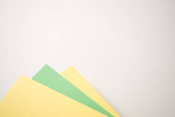 Green, yellow and white geometric abstract background with copy empty space