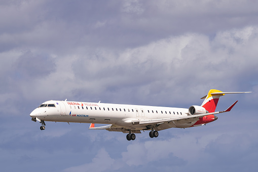 Los Rodeos, Tenerife, Canary islands; March 30 2024: Iberia regional Mitsubishi CRJ-1000, landing, in La Laguna city airport