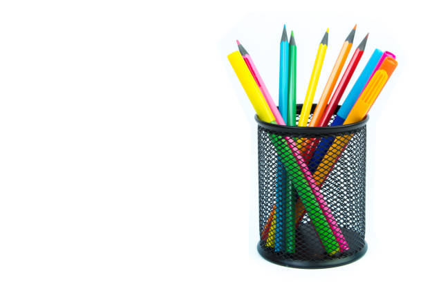 Color image depicting a close up macro abstract view of a collection of colored pencils.