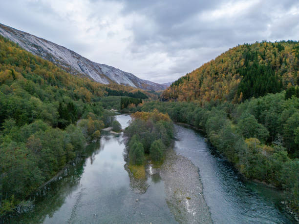 istock River Through Mountainous Terrain In Autumn 2150412531
