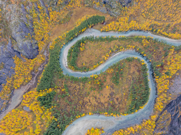 istock Serpentine River Winding Through Foliage In Autumn 2150413090
