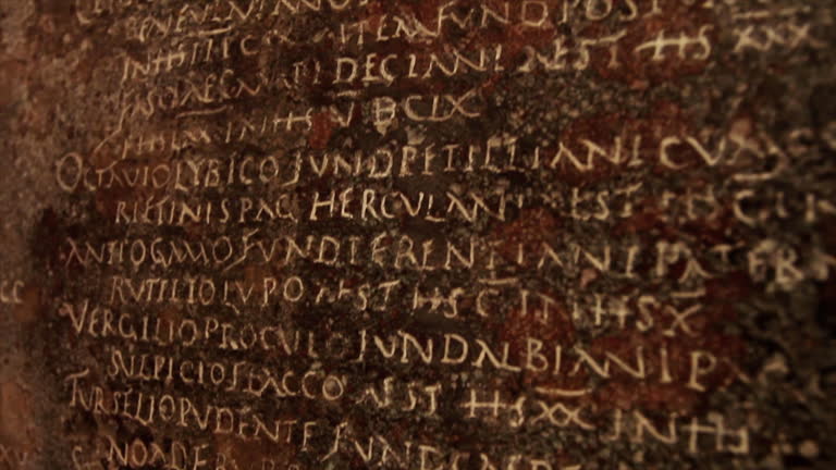 Latin script on dark marble in ancient Rome