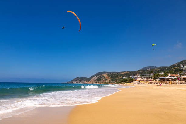istock Paragliders soaring above Kleopatra Beach Alanya Turkey 2150417797