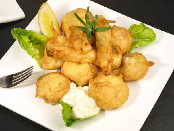 istock Fried Champignon and Vegetables with Garlic Sauce on a Plate 2150420536