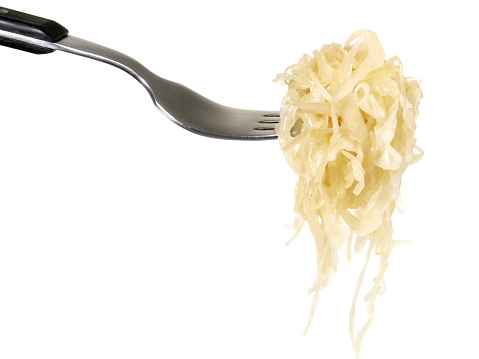Fresh Sauerkraut on a Fork - White Background