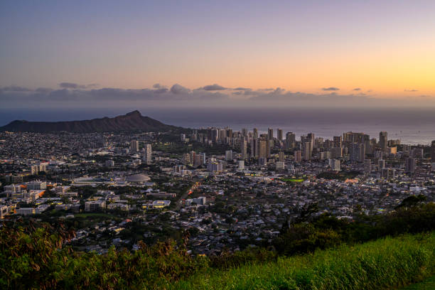 View from the Tantalus Lookout to the skyline of Honolulu and Diamond Head after sunset - Oahu, Hawaii