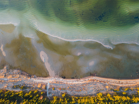 Sandy shore of the Baltic Sea in Estonia, photo from a drone on a spring day. High quality photo