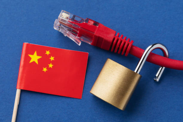istock An open padlock on a computer network wire and a Chinese flag on a colored background, a concept on the topic of Internet technology security in China 2150421850