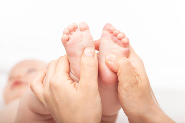istock Baby Reflexology Foot Massage 2150423304