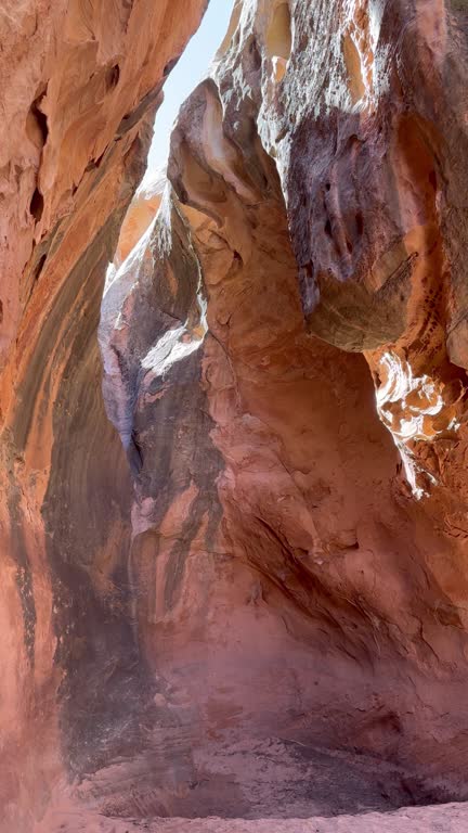 A stunning dry waterfall rock formation in a slot canyon in Capitol Reef National Park