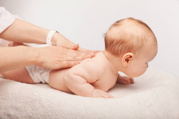 istock Baby chiropractic back treatment 2150426347