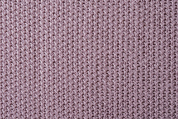 istock The knitted texture is the same color as a dusty rose. 2150428474