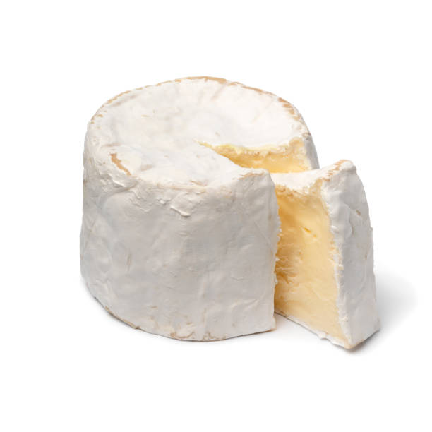 istock Single French Chaource cheese and a piece isolated on white background 2150430151