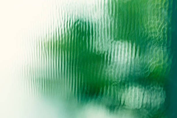 istock green white abstract light trough glass abstract background 2150430241