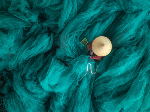 Woman knitting net
