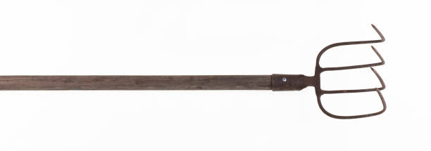 old agricultural pitchfork isolated on white background