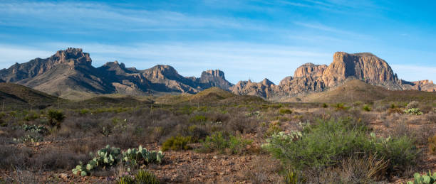 The blue hour opening through the window view of the Chisos mountains in Big Bend national park.