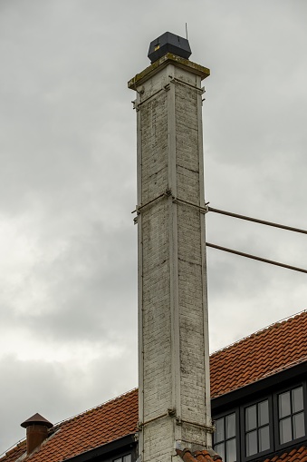 free-standing chimneys on an old house
