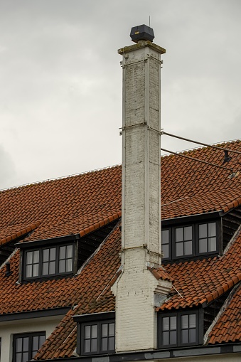 free-standing chimneys on an old house