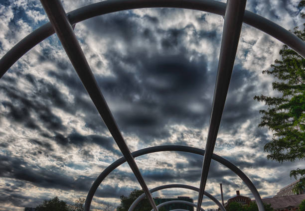 Looking up at the bridge supports on a pedestrian bridge