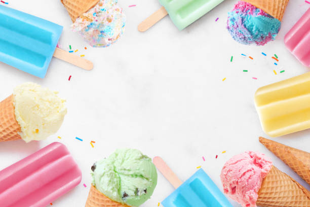 istock Colorful pastel ice cream cones and summer popsicle  frame on a white marble background 2150446879