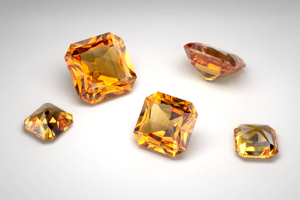 Scattering of topazes of different sizes on a white background. Cut in radiant style. 3d rendering. stock photo