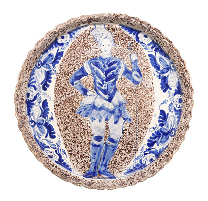 Maiolica plate with flower decoration and man. Padova, Italy