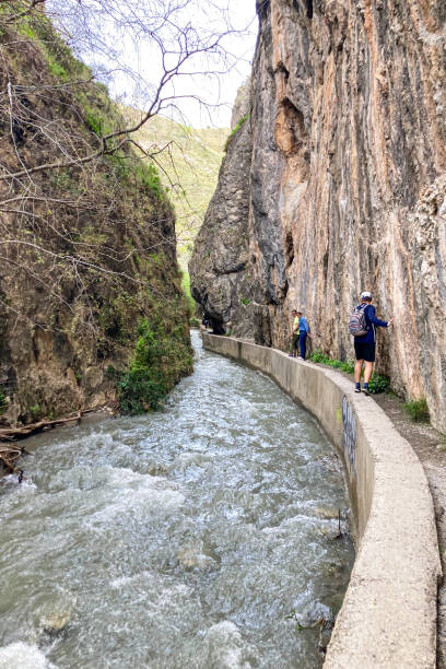 istock Trail of Sabina over Monachil river 2150451279
