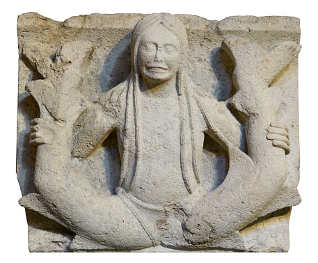 Two-tailed siren (Sirena bicaudata). Metope of Modena Cathedral. Modena, Italy