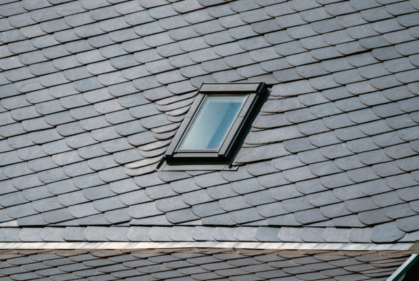 istock Attic window in the house roof 2150453901
