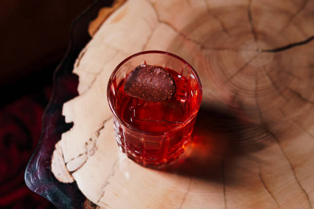 istock Alcoholic drink. A cocktail with elite alcohol on dark black background 2150456411