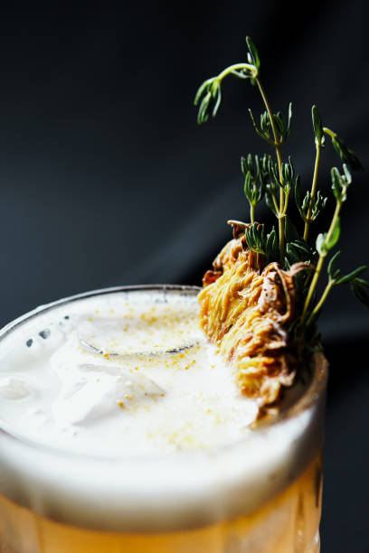 istock Alcoholic drink. A cocktail with elite alcohol on dark black background 2150456467