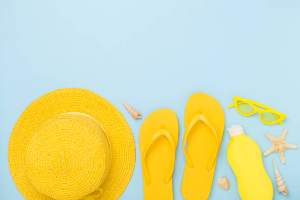 istock Flat lay with yellow summer outfit on color background. Vacation concept 2150456476