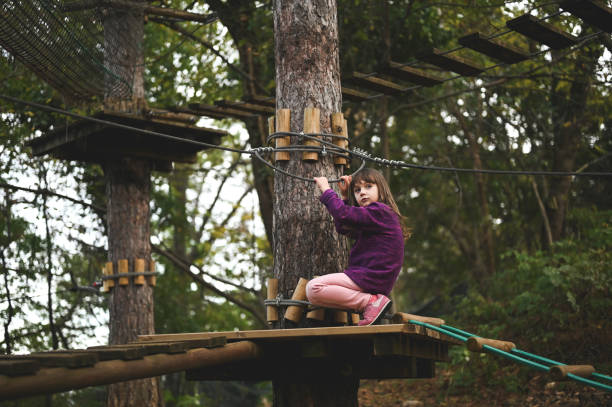 istock climbing in adventure park 2150456804