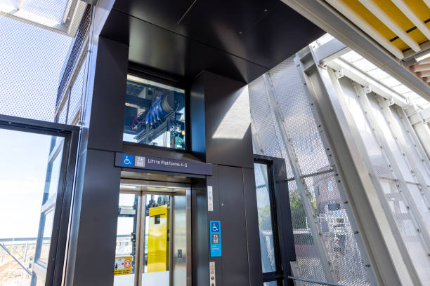 istock Train station modern elevator in pedestrian overpass footbridge, background with copy space 2150460350