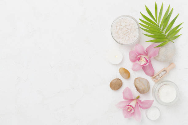 istock Composition with orchids, spa products on concrete background, top view 2150461086