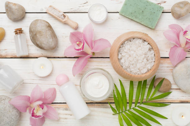 istock Composition with orchids, spa products on wooden background, top view 2150461087