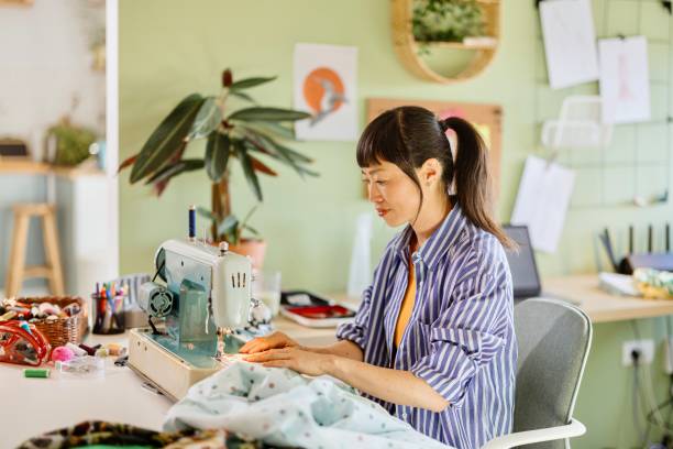 istock Woman creating customized clothes at home 2150463839