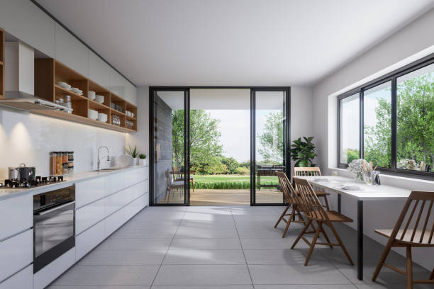 istock Modern Style white kitchen and dining room interior with nature view 3d render 2150465455