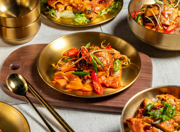istock Braised Mackerel Stewed Radish with spoon and chopsticks served in golden dish isolated on wooden board side view of honk kong food 2150465721