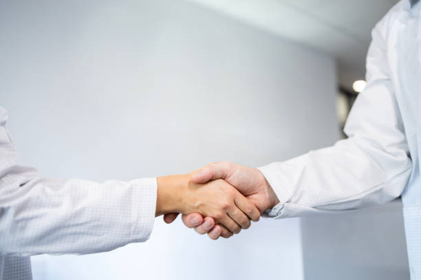 istock Close up view of doctor's hands shaking inside the clinic. 2150470304