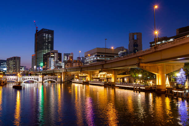 istock Urban twilight: cityscape with illuminated bridges 2150470364