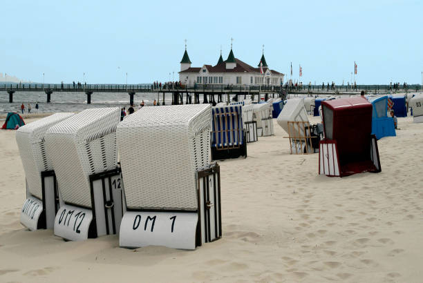 Baltic Sea beach in the Ahlbeck sea bad on Usedom in cool and windy weather in June - Germany.