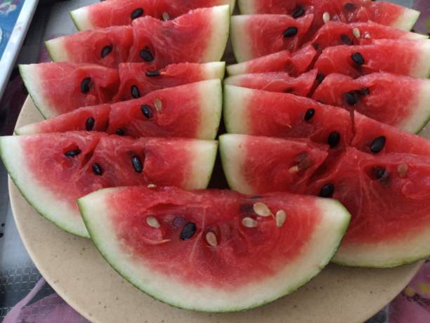 istock Fresh watermelon slices served. Red watermelon fruit. 2150476208